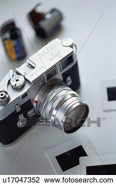 Stock Photo - camera and slides. 
fotosearch - search 
stock photos, 
pictures, images, 
and photo clipart