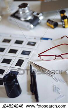 Stock Photo - camera and slides. 
fotosearch - search 
stock photos, 
pictures, images, 
and photo clipart