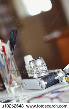 Stock Photo - camera and stationeries. 
fotosearch - search 
stock photos, 
pictures, images, 
and photo clipart