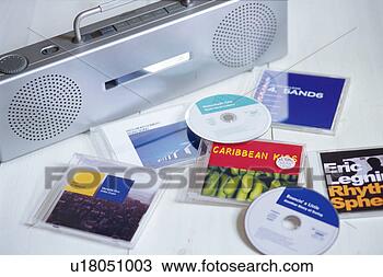 Stock Photo - cds and cd player. 
fotosearch - search 
stock photos, 
pictures, images, 
and photo clipart