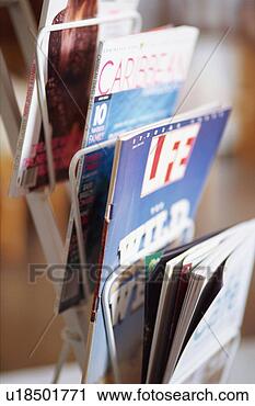 Stock Photography - magazines in rack. 
fotosearch - search 
stock photos, 
pictures, images, 
and photo clipart