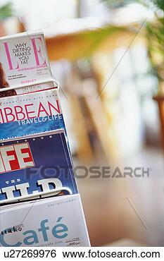 Stock Photo - magazines in rack. 
fotosearch - search 
stock photos, 
pictures, images, 
and photo clipart