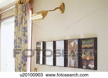 Stock Photo - picture frames 
on wall. fotosearch 
- search stock 
photos, pictures, 
images, and photo 
clipart