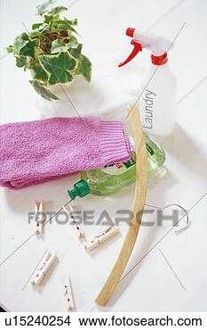 Stock Photo - potted plant, 
spray and towel. 
fotosearch - search 
stock photos, 
pictures, images, 
and photo clipart