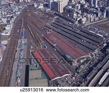Stock Photo - aerial view of 
railway tracks 
and skyscrapers 
in the city. fotosearch 
- search stock 
photos, pictures, 
images, and photo 
clipart