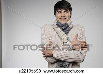 Stock Photo - man with a cold, 
shivering. fotosearch 
- search stock 
photos, pictures, 
images, and photo 
clipart