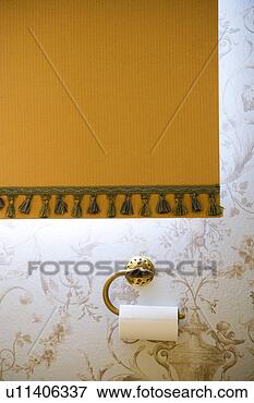 Picture - detail of toilet 
paper roll and 
yellow curtain. 
fotosearch - search 
stock photos, 
pictures, images, 
and photo clipart