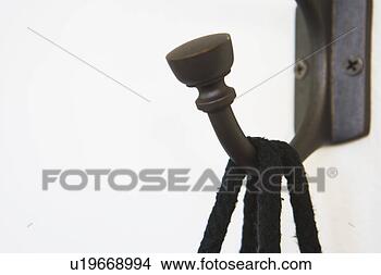 Stock Photo - hook holding rope 
handles of gift 
bag. fotosearch 
- search stock 
photos, pictures, 
images, and photo 
clipart