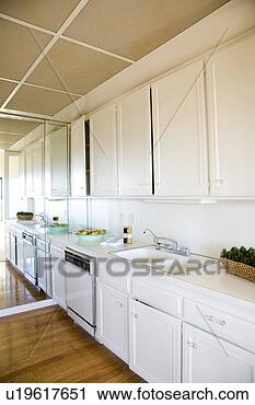 Stock Photography - kitchen with white 
cabinets. fotosearch 
- search stock 
photos, pictures, 
images, and photo 
clipart