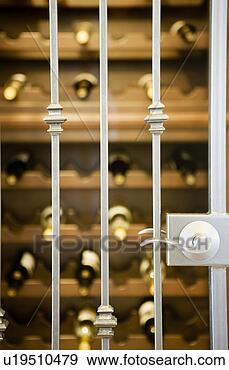 Stock Photograph - secured wine rack. 
fotosearch - search 
stock photos, 
pictures, images, 
and photo clipart