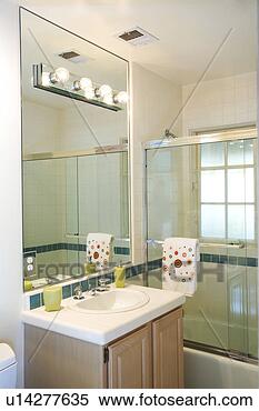 Stock Image - traditional bathroom 
sink and mirror. 
fotosearch - search 
stock photos, 
pictures, images, 
and photo clipart