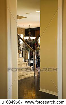 Picture - view to staircase 
through doorway. 
fotosearch - search 
stock photos, 
pictures, images, 
and photo clipart
