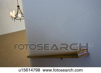 Stock Photo - wall mounted wood 
bannister in stairway. 
fotosearch - search 
stock photos, 
pictures, images, 
and photo clipart