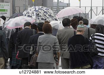 Stock Photography - people walking 
in street. fotosearch 
- search stock 
photos, pictures, 
images, and photo 
clipart