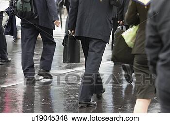 Stock Photo - people walking 
in street. fotosearch 
- search stock 
photos, pictures, 
images, and photo 
clipart