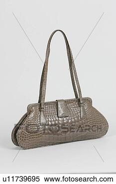 Stock Image - handbag, hang, 
bag, female, items. 
fotosearch - search 
stock photos, 
pictures, images, 
and photo clipart