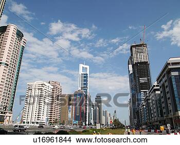 Stock Photo - dubai, sheikh, 
zayed, road, towers, 
sky, scrapper. 
fotosearch - search 
stock photos, 
pictures, images, 
and photo clipart