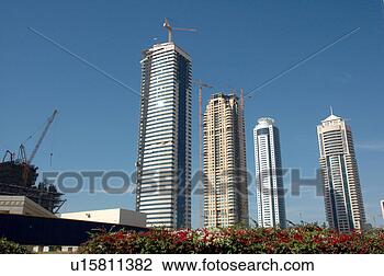 Stock Photo - dubai, towers, 
high, rise. fotosearch 
- search stock 
photos, pictures, 
images, and photo 
clipart