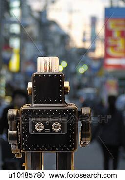 Stock Illustration - toy doll, robot 
and shopping district, 
rear view, differential 
focus. fotosearch 
- search clipart, 
illustration, 
drawings and vector 
eps graphics images