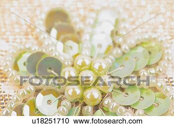 Stock Photography - beads art,  accessory, 
 objects of craftwork, 
 craftwork,  fine 
arts. fotosearch 
- search stock 
photos, pictures, 
images, and photo 
clipart