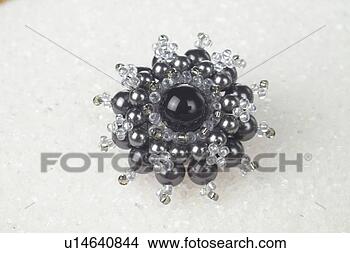 Stock Photo - beads art,  brooch, 
 objects of craftwork, 
 craftwork,  fine 
arts. fotosearch 
- search stock 
photos, pictures, 
images, and photo 
clipart