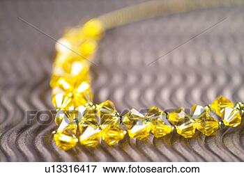 Picture - objects of craftwork, 
 accessory,  craftwork, 
 fine arts,  necklace. 
fotosearch - search 
stock photos, 
pictures, images, 
and photo clipart