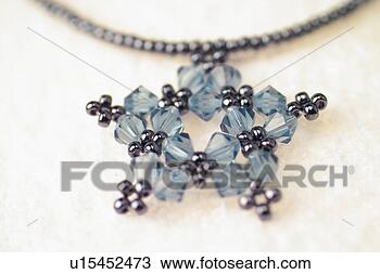 Stock Photo - objects of craftwork, 
 accessory,  craftwork, 
 fine arts,  necklace. 
fotosearch - search 
stock photos, 
pictures, images, 
and photo clipart