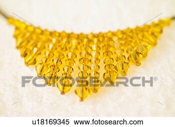 Stock Image - objects of craftwork, 
 accessory,  craftwork, 
 fine arts,  necklace. 
fotosearch - search 
stock photos, 
pictures, images, 
and photo clipart