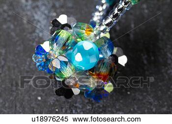 Stock Image - objects of craftwork, 
 accessory,  craftwork, 
 fine arts,  necklace. 
fotosearch - search 
stock photos, 
pictures, images, 
and photo clipart