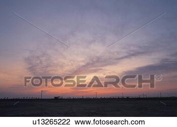 Stock Photo - natural world, 
scenery, sky, 
sundown, sunset, 
nature, natural. 
fotosearch - search 
stock photos, 
pictures, images, 
and photo clipart