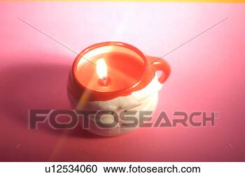 Stock Photography - candle holder, 
 fire,  burning 
candle,  candlelight, 
 lighting. fotosearch 
- search stock 
photos, pictures, 
images, and photo 
clipart
