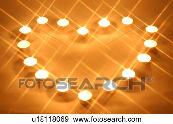 Stock Photograph - candlelight,  
light,  heart, 
 candle,  lighting, 
 burning candle. 
fotosearch - search 
stock photos, 
pictures, images, 
and photo clipart