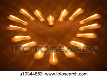 Stock Photo - candlelight,  
light,  heart, 
 candle,  lighting, 
 burning candle. 
fotosearch - search 
stock photos, 
pictures, images, 
and photo clipart