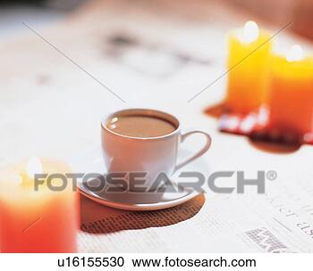 Stock Photography - newspaper, coffee, 
candlelight, candle, 
teacup, aromatic, 
tea. fotosearch 
- search stock 
photos, pictures, 
images, and photo 
clipart