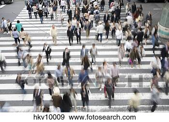 Stock Photograph - blurred motion 
shot of people 
in crosswalk. 
fotosearch - search 
stock photos, 
pictures, images, 
and photo clipart