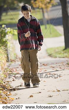 Picture - boy reading text 
message. fotosearch 
- search stock 
photos, pictures, 
images, and photo 
clipart