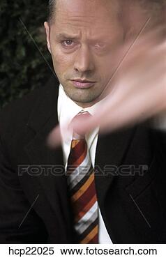Stock Image - businessman frowning. 
fotosearch - search 
stock photos, 
pictures, images, 
and photo clipart