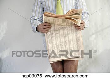 Stock Image - businessman in 
semi-dress reading 
newspaper. fotosearch 
- search stock 
photos, pictures, 
images, and photo 
clipart