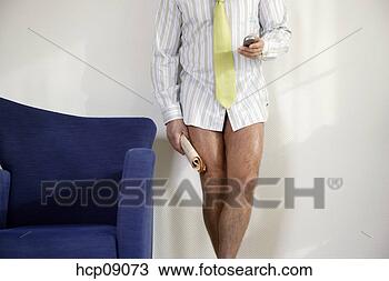 Stock Photo - businessman in 
semi-dress. fotosearch 
- search stock 
photos, pictures, 
images, and photo 
clipart
