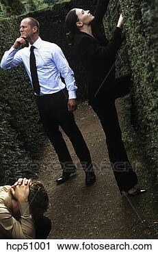 Stock Photography - businesspeople 
lost in hedge 
maze. fotosearch 
- search stock 
photos, pictures, 
images, and photo 
clipart