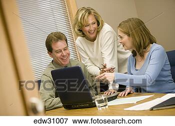 Picture - businesspeople 
talking at conference 
table. fotosearch 
- search stock 
photos, pictures, 
images, and photo 
clipart