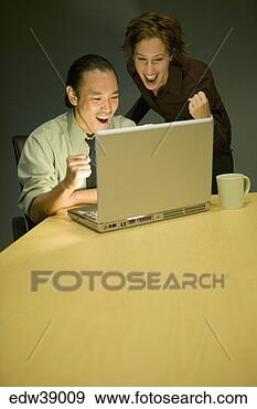 Stock Photograph - businesspeople 
using laptop. 
fotosearch - search 
stock photos, 
pictures, images, 
and photo clipart