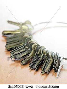 Stock Photo - close-up of keys 
on a large ring. 
fotosearch - search 
stock photos, 
pictures, images, 
and photo clipart