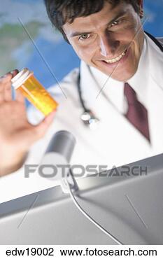 Stock Photo - doctor on webcam 
holding up prescription. 
fotosearch - search 
stock photos, 
pictures, images, 
and photo clipart