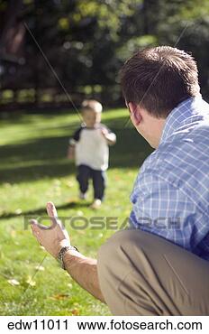Stock Photography - father playing 
with toddler. 
fotosearch - search 
stock photos, 
pictures, images, 
and photo clipart