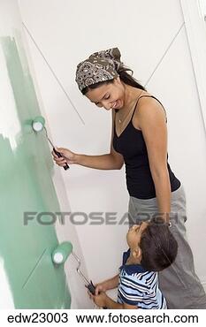 Stock Photo - hispanic mother 
and son painting 
wall together. 
fotosearch - search 
stock photos, 
pictures, images, 
and photo clipart
