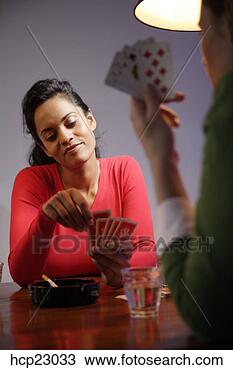 Stock Photo - hispanic women 
playing poker. 
fotosearch - search 
stock photos, 
pictures, images, 
and photo clipart