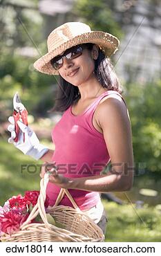 Stock Photo - indian woman gardening. 
fotosearch - search 
stock photos, 
pictures, images, 
and photo clipart