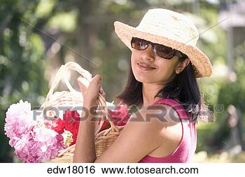 Stock Photo - indian woman gardening. 
fotosearch - search 
stock photos, 
pictures, images, 
and photo clipart
