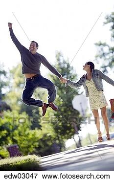 Picture - man clicking his 
heels together. 
fotosearch - search 
stock photos, 
pictures, images, 
and photo clipart